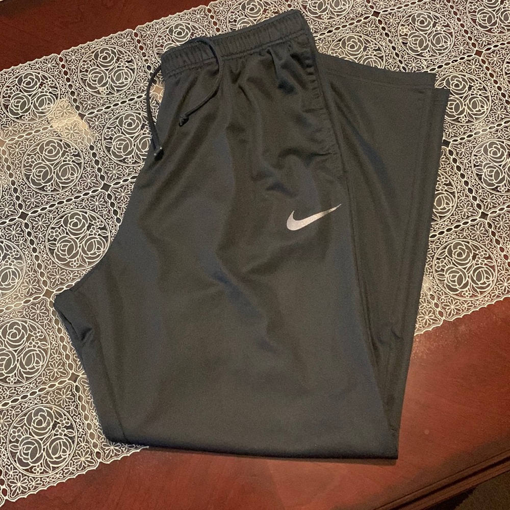 Black Nike pants.